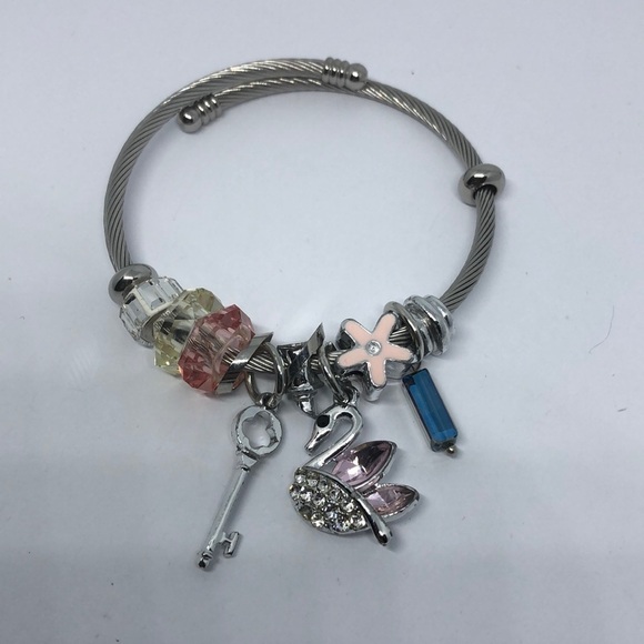 SILVER tone memory coil rope slide and dangle charm bracelet swan key flower. - Picture 1 of 2